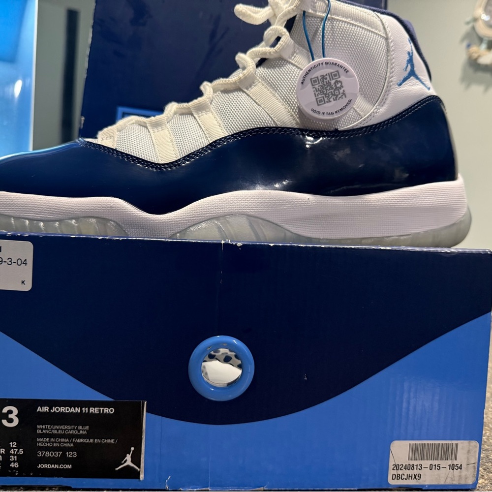 Jordan 11 Retro White and Navy Sneakers
